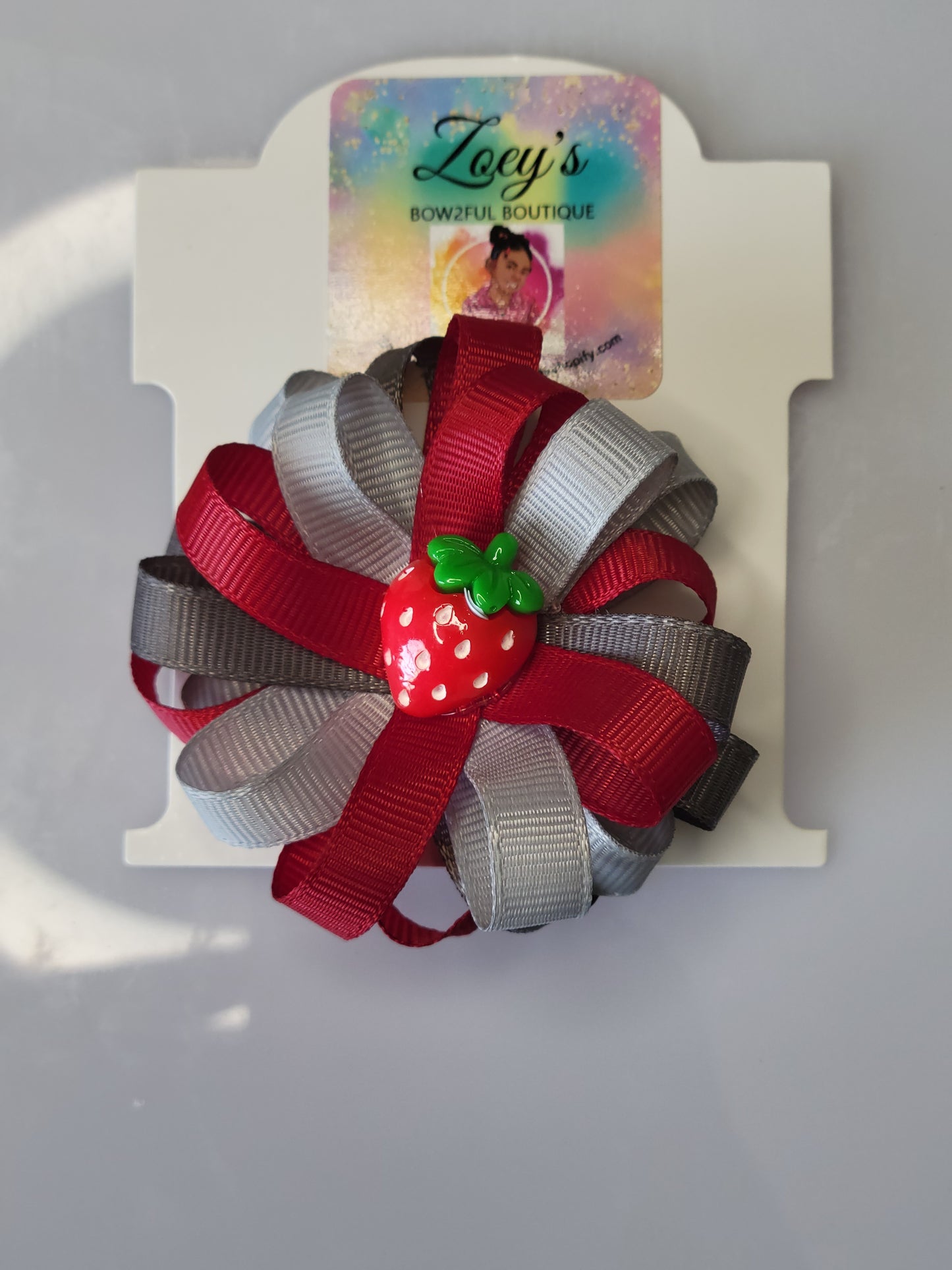 Red and grey strawberry bow