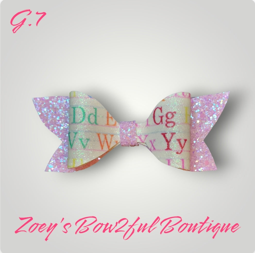 Pink glitter faux leather bow